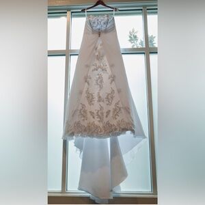 Elegant White Strapless Wedding Gown with Silver Embellishments